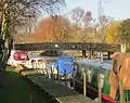 Beccles: upstream view of Bridge St bridge, showing height limit