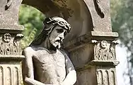 Detail of a 19th-century tomb in the church graveyard