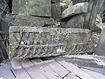 Fallen lintel showing the Churning of the Sea of Milk.