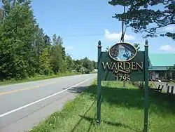 City limit sign in Warden.