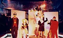Big Bang performing their Arabic Circus Tour with circus performers (note the aerialists in the background), 1989–1990