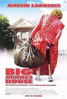 A fat woman in a red dress, carrying a big brown bag, and fixing her dress while walking towards a house.