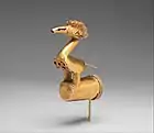 Bird finial; 5th–10th century; gold; height 12.1&nbsp;cm (4.mw-parser-output .frac{white-space:nowrap}.mw-parser-output .frac .num,.mw-parser-output .frac .den{font-size:80%;line-height:0;vertical-align:super}.mw-parser-output .frac .den{vertical-align:sub}.mw-parser-output .sr-only{border:0;clip:rect(0,0,0,0);clip-path:polygon(0px 0px,0px 0px,0px 0px);height:1px;margin:-1px;overflow:hidden;padding:0;position:absolute;width:1px}3⁄4 in.); Metropolitan Museum of Art (New York City)