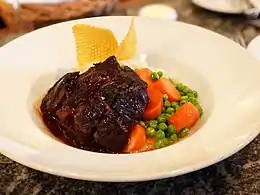 Daube de boeuf with buttered carrots and peas at Bistro Jeanty in Yountville, California