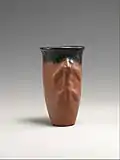 Black-topped red ware jar with a climbing animal, Metropolitan Museum of Art
