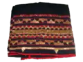 A black and red tapis
