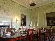 The dining room. The Dining Room was converted from the 16th century Great Hall by the second Duke as he turned the old castle into a Georgian mansion house Thomas Clayton’s plasterwork can be seen here and throughout much of the castle.