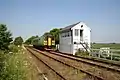 Blotoft signal box (Helpringham)with a Class 153 unit passing.