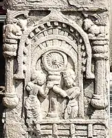 Scene on the Bodh Gaya railings (replica), representing a building