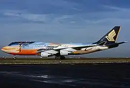 9V-SPL in tropical livery