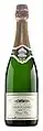 Bottle of sparkling wine with its characteristic covering.