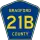 County Road 21B marker
