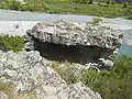 Hollow chamber below roadway