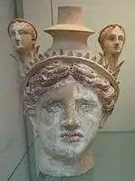 Female head incorporating a vase (lekythos), c. 325-300 BC.