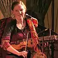 Bronwyn Bird, member of Blue Moose, plays the nyckelharpa at a concert in 2007. Photo by georgie grd.