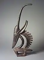Chiwara headdress (male); late 19th-early 20th century; 72.4 x 30.5 x 7&nbsp;cm (28.mw-parser-output .frac{white-space:nowrap}.mw-parser-output .frac .num,.mw-parser-output .frac .den{font-size:80%;line-height:0;vertical-align:super}.mw-parser-output .frac .den{vertical-align:sub}.mw-parser-output .sr-only{border:0;clip:rect(0,0,0,0);clip-path:polygon(0px 0px,0px 0px,0px 0px);height:1px;margin:-1px;overflow:hidden;padding:0;position:absolute;width:1px}1⁄2 x 12 x 2.mw-parser-output .frac{white-space:nowrap}.mw-parser-output .frac .num,.mw-parser-output .frac .den{font-size:80%;line-height:0;vertical-align:super}.mw-parser-output .frac .den{vertical-align:sub}.mw-parser-output .sr-only{border:0;clip:rect(0,0,0,0);clip-path:polygon(0px 0px,0px 0px,0px 0px);height:1px;margin:-1px;overflow:hidden;padding:0;position:absolute;width:1px}3⁄4 in.); by Bambara people; Brooklyn Museum. Chiwara masks are categorized in three ways: horizontal, vertical, or abstract. In addition, Chiwara can be either male or female