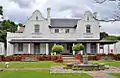 Brooks House was built shortly after James Brooks purchased the land that would form part of Brooklyn, Pretoria in 1886. James Brooks was partially responsible for the layout of the Brooklyn township.