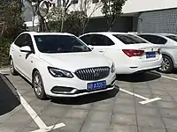 Pre-facelift Buick Excelle GT sedans front and rear.