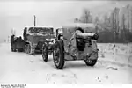 A gun in German service towed by a half-track in Northern Russia during the Winter of 1943.