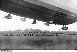 R33 with Gloster Grebe fighters in 1926.