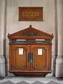 A wooden wall box in Burlington House, London.