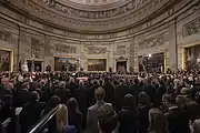 Mourners circumambulate the casket of George H.W. Bush during the lying in state on December 3, 2018
