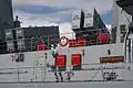 Two 4-cell C-802 anti-ship missile launchers.
