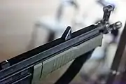 Detail of the top-mounted arming lever of the C42