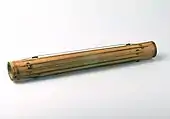 North Sumatra, Indonesia, Toba Batak people, c. 1852. Tanggetong. Also called gondang buluh. "Gondang," Indonesian for Ficus variegata. "Buluh," Indonesian for bamboo. Tube zither with idiochord strings (strings made from the tube itself). Polychord.