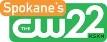 In a green rounded rectangle, The CW logo in white and the numeral 22 in white. The second 2 is slightly higher than the first, and the 2s match those in KREM's logo. The letters KSKN are placed under the second 2 in dark green. The upper left of this is overlapped by an orange rounded rectangle containing the word "Spokane's".