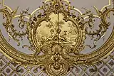 Rococo ornaments with putti, in the Cabinet de la Pendule, part of the Palace of Versailles (France)