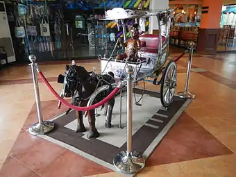 Cartela (or "Kartela", a Philippine horse carriage, in art (8 Waves Waterpark & Hotel San Rafael, Bulacan).