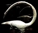 Casque in the shape the head of a bird, found at Tintignac.