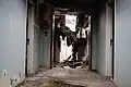 The top (4th) floor has almost entirely collapsed