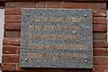 Memorial plaque on Chekhov Shop museum. The inscription reads:"In this house Anton Chekhov spent 5 years of his childhood (1869-1874).And in this same building the writer's father kept his shop."
