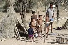 Bushmen children with their father
