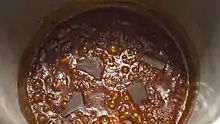A sauce for chili stew prepared using whisky