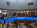 The centre court and food court 13 years later on September 9, 2019, after renovations, showing a WirelessWave ad, and Dairy Queen, New York Fries, Edo Japan, and TacoTime, among others can be seen in the food court.