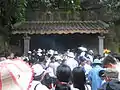 Crowds convening for the Festival at the entry to the Old Temple