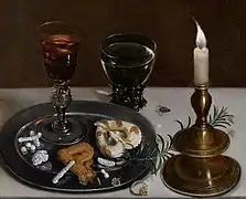 Clara Peeters, Still life with dainties, rosemary, wine, jewels and a burning candle