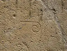 Mason's mark on exterior of Coimbra Cathedral, Portugal, 12th century