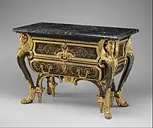 Commode; by André Charles Boulle; c. 1710–1732; walnut veneered with ebony and marquetry of engraved brass and tortoiseshell, gilt-bronze mounts, antique marble top; 87.6 x 128.3 x 62.9&nbsp;cm; Metropolitan Museum of Art