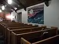 Chapel interior, showing wall-hanging