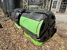 Compost rollers are used to cleanly produce rich, organic compost for sustainable gardens.&nbsp; Food waste, veggie scraps, grass clippings, cardboard, biochar, leaves and other biomass are mixed together.&nbsp; These inputs have varying levels of carbon and nitrogen which are required for producing compost.&nbsp; Microbes and insects break down these inputs into a rich soil amendment to help fertilize plants sustainably.