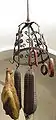 Jambon d'Ardenne ham hanging from a rack.