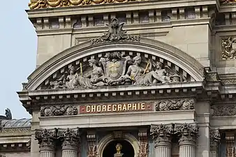 Beaux-Arts pediment with sculptures on the facade of the Palais Garnier, Paris