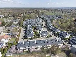 Arial view on the neighbourhood of Wille Laguna (Lagoon Villas) and the Lipkowski Pond, located within Dąbrówka, in 2022.