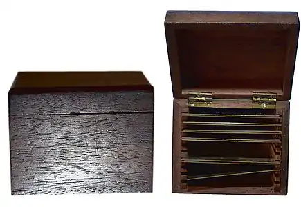 Small Wooden box containing uncased primitive daguerreotypes.  They are the early work of John Draper  and Samuel Morse at New York University (NYU) in the fall of 1839. A failed image attempt and four  good images from the box are posted in this gallery.