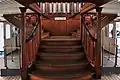 wooden stairway between the two passenger decks