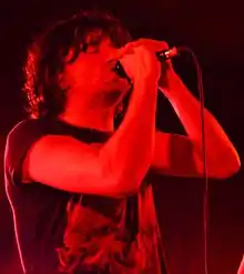 Danny McNamara on stage with Embrace